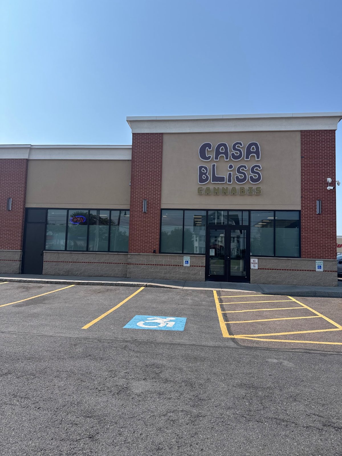 Casa Bliss Cannabis storefront with the sign above the entrance